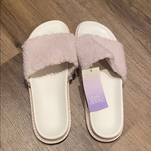 Pink fuzzy house slippers